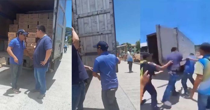 tobias Tobias Fornier, Antique’s Mayor Ernesto Tajanlangit (left) and Vice Mayor Jojo Fornier (right) confront one another at the back of a van carrying family food packs on Monday, April 29. Mayor Ernesto Tajanlangit/FB