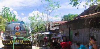 The Bacolod City Disaster Risk Reduction and Management Office and the Philippine Red Cross-Bacolod facilitated the distribution of 16,000 liters of water to residents of Purok Himaya, Barangay Mansilingan on Tuesday, April 16. DRRMO BACOLOD CITY/FACEBOOK PHOTO