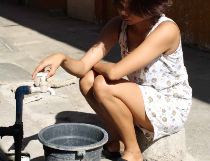 water struggle College student Natasha Eseller says they have no water supply at their apartment on General Luna Street, City Proper in Iloilo City for two weeks already. She adds they fetch water from a nearby deep well. AJ PALCULLO/PN