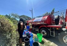Residents of Barangay Balabago, Jaro, Iloilo City who were affected by the scheduled power interruption on April 21 got free water from MORE Electric and Power Corporation. PHOTO BY MORE POWER