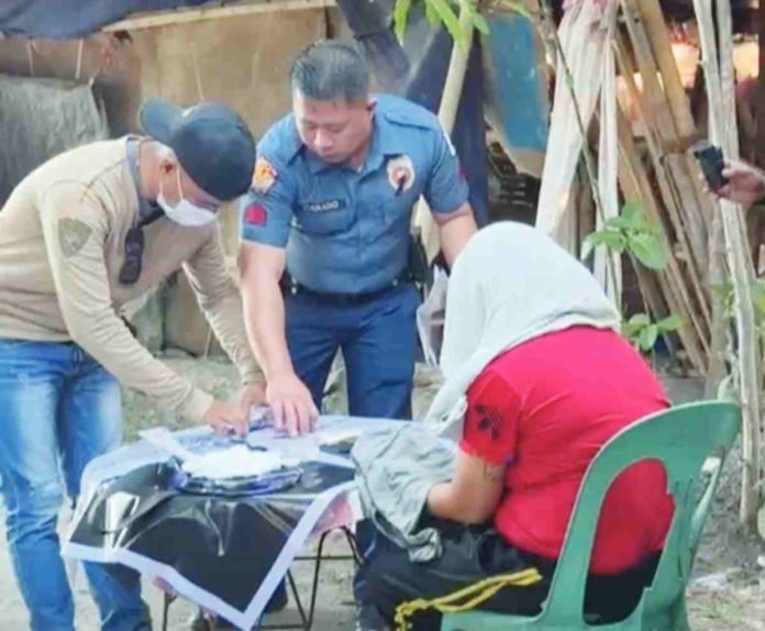 woman pic Police officers of the Barotac Nuevo Municipal Police Station confiscated P1,802,000 worth of suspected shabu from drug suspect “Riz” on April 29. SCREENGRABBED FROM RMN ILOILO 774 FACEBOOK VIDEO