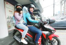 Biz groups bat for greater women participation in workforce Angkas driver Rizza Capuyan Concha picks up a passenger on Jupiter Street, Makati City. MARIANNE BERMUDEZ/INQMOBILITY.COM PHOTO