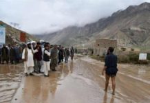 Afghanistan floods kill at least 50 Afghans gather along a road between Samangan and Mazar-i-Sharif covered in mud following a flash flood after a heavy rainfall. GETTY IMAGES