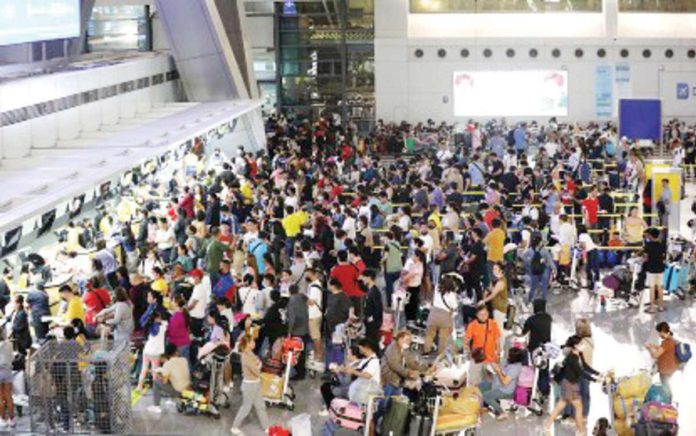 Thousands of passengers were stranded at the Ninoy Aquino International Airport Terminal 3 in Pasay City in this January 1, 2023 photo, due to "technical issues" of the air traffic management system of the Civil Aviation Authority of the Philippines. PNA FILE PHOTO BY AVITO DALAN