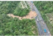 A collapsed highway on a mountainside in Guangzhou, China is seen in this drone footage. CCTV