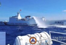 A China Coast Guard ship fires its water cannon at Philippine Coast Guard (PCG) vessels escorting supply boats chartered by the Armed Forces of the Philippines in this August 2023 photo. The Philippine boats were delivering supplies to troops at BRP Sierra Madre in Ayungin (Second Thomas) Shoal when confronted by the Chinese. VIDEOGRAB FROM PCG FACEBOOK PAGE