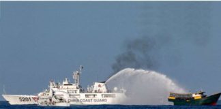 A Chinese Coast Guard vessel fires its water cannon at the Philippine resupply vessel Unaizah on its way to a resupply mission at Ayungin (Second Thomas) Shoal in the West Philippine Sea. REUTERS