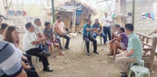 Dr. Ernesto Servillon Jr. (center), Schools Division Superintendent of Iloilo Province, visits the bereaved family of a Grade 10 student in Maasin, Iloilo to convey condolences and address the family's call for justice, on Monday, May 13. SDO ILOILO PROVINCE PHOTO