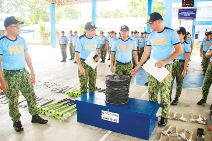 IPPO_pic_copy_resized Police Colonel Bayani Razalan, officer-in-charge director of the Iloilo Police Provincial Office (IPPO), leads the inspection and inventory of search and rescue equipment at the Camp Francisco U. Sumagaysay Sr. in Santa Barbara, Iloilo on Tuesday, May 28. This activity aims to ensure that police personnel are fully equipped and prepared to effectively handle various types of disasters and emergencies. IPPO PHOTO