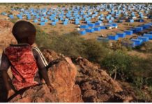 Possible genocide committed in Sudan, says rights group A boy sits atop a hill overlooking a refugee camp near the Chad-Sudan border. Paramilitary forces in Sudan are being accused of an ethnic cleansing amid a civil war. REUTERS
