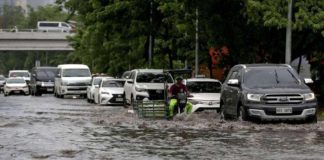 This May 26, 2024 photo shows the flooded portion of Buendia Avenue in Pasay City due to continuous rain brought by Tropical Storm Aghon. INQUIRER / RICHARD A. REYES