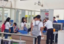 The Bureau of Quarantine issued Bureau Memorandum No. 2024-48 placing the country’s airports and seaports on “heightened” alert to “thoroughly” screen foreigners or Filipinos coming from countries with reported cases of COVID FLiRT variants. Photo shows passengers undergoing routine security checks before entering the boarding area of Iloilo Airport. PN FILE PHOTO
