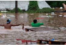 People wade through flooded streets in Encantado, Rio Grande do Sul state, southern Brazil. The municipality of Encantado has turned into a river, as residents have been desperately trying to move to higher ground. Reuters