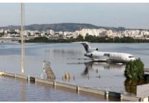 A cargo plane sits on a flooded runway at the airport in Porto Alegre, Rio Grande do Sul, Brazil. With runways under water, getting aid to flood-hit affected areas has been hard. REUTERS