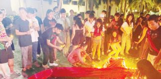 The Family Planning Organization of the Philippines and the Iloilo Provincial Social Welfare and Development Office lead the International AIDS Candlelight Memorial to remember the many lives lost to AIDS, at the Iloilo provincial capitol grounds on May 19.
