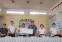 Former Ilonggo senator Franklin Drilon (4th from left) and MORE Electric and Power Corporation president and chief executive officer Roel Castro (3rd from left) turn over a check worth P704,000 to the Negrense Volunteers for Change Foundation, Inc. to fund the provision of Mingo Meals for 88 malnourished children in San Miguel, Iloilo.