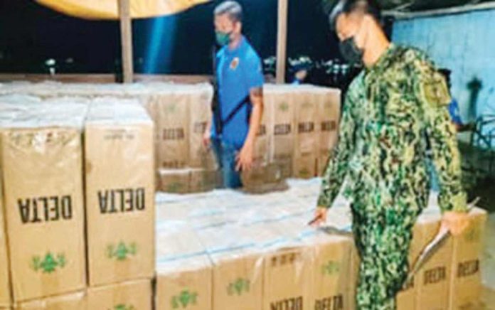 electronic_invoicing_resized President Ferdinand Marcos has ordered the imposition of electronic invoicing of all imported goods through Administrative Order No. 23 signed by Executive Secretary Lucas Bersamin on May 13, 2024. Photo shows government operatives confiscating a total of P7.8 million worth of smuggled cigarettes in separate anti-smuggling operations in August 2022. AREA POLICE COMMAND-WESTERN MINDANAO PHOTO