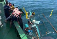 Philippine Coast Guard personnel rescued six fishermen after their motor banca submerged off the coast of Silay City Negros Occidental on Sunday morning, May 12. PHILIPPINE COAST GUARD NEGROS OCCIDENTAL PHOTO