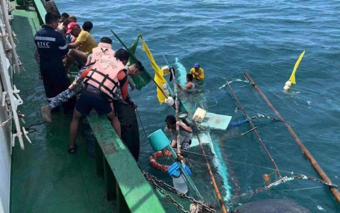 fishermen_rescued_pic_resized Philippine Coast Guard personnel rescued six fishermen after their motor banca submerged off the coast of Silay City Negros Occidental on Sunday morning, May 12. PHILIPPINE COAST GUARD NEGROS OCCIDENTAL PHOTO