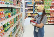 A Department of Trade and Industry Region 6 personnel monitors the prices of basic necessities. Consumers, especially those in areas under a state of calamity, are encouraged to report retailers selling basic necessities above the specified price freeze. PHOTO FROM DTI-REGION 6