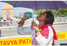 A visitor drinks water at India Gate during a hot weather on May 26, 2024 in New Delhi. India’s weather office has issued a severe heatwave alert for parts of Indian capital Delhi. GETTY IMAGES