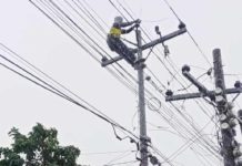 The recent increase in electricity bills was driven by two primary factors – a surge in consumer power consumption and rising prices at the Wholesale Electricity Spot Market, says Iloilo III Electric Cooperative, Inc. (ILECO III). Photo shows an ILECO II lineman replacing damaged insulator on Rizal Street, Pototan town. ILECO II PHOTO