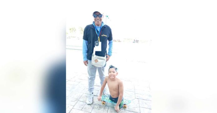 mae Cadiz para swimmer_superimposed Swimming sensation Zach Lucas Obsioma and his coach Max Fermales. PHOTO BY MARIA EVIA OBSIOMA