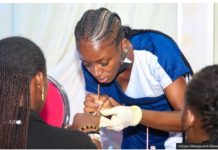Lisha Dachor says she attempted to make a world record for teen mothers in Nigeria. FALOPE GBENGA AND GIBSON OGUNKUNLE