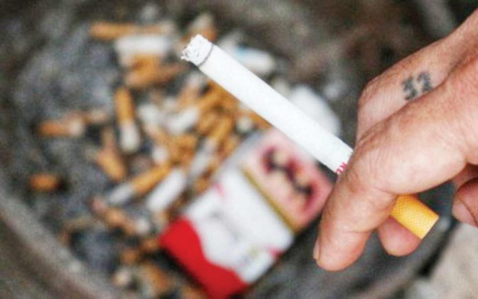 smoking1_resized_resized Smoking, both from lighted cigarettes and electronic devices, introduces over 7,000 chemical components into the body, many of which are carcinogenic, according to John Richard Lapascua, Nurse V at Department of Health Region 6. PNA FILE PHOTO BY ROBINSON NIÑAL JR.
