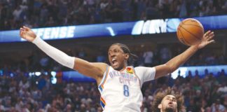Oklahoma City Thunder's Jalen Williams loses handle of the ball after driving past the defense of Dallas Mavericks' Dereck Lively II. PHOTO BY TIM HEITMAN/GETTY IMAGES
