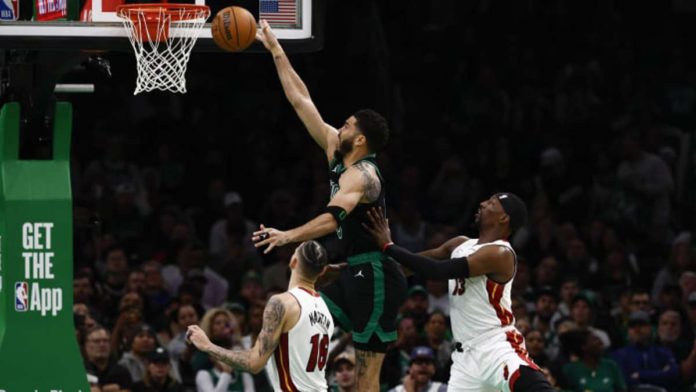 sports_Boston_resized Boston Celtics forward Jason Tatum stretches for a layup. PHOTO COURTESY OF WINSLOW TOWNSON/USA TODAY