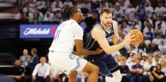 Dallas Mavericks; Luka Doncic attempts to blow past the defense of Minnesota Timberwolves’ Naz Reid. PHOTO COURTESY OF SPORTSKEEDA