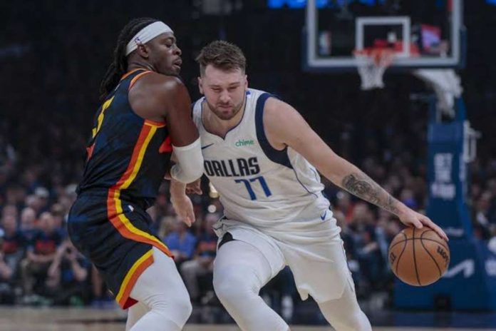 sports_Dallas_resized Dallas Mavericks’ Luka Doncic attacks the defense of Oklahoma City Thunder’s Luguentz Dort. AP PHOTO