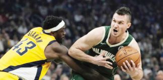 Milwaukee Bucks forward Danilo Gallinari protects the ball from the defense of Indiana Pacers’ Paskal Siakam. PHOTO courtesy of Morry Gash/AP