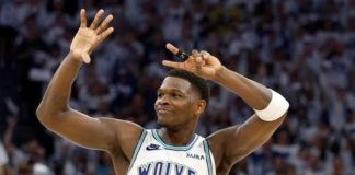 Minnesota guard Anthony Edwards gestures “seven” to the crowd as the Timberwolves send their NBA Western Conference semifinals series with Denver Nuggets to a do-or-die Game 7. PHOTO BY DAVID BERDING/GETTY IMAGES