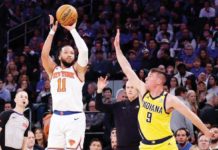 Jalen Brunson of the New York Knicks shoots over T.J. McConnell of the Indiana Pacers. PHOTO COURTESY OF SARAH STIER/GETTY IMAGES