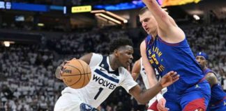 Minnesota Timberwolves’ Anthony Edwards tries to attack the defense of Denver Nuggets’ Nikola Jokić. PHOTO COURTESY OF USA TODAY SPORTS