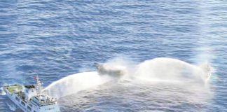 Manila has asked Beijing to order all its vessels to leave Ayungin Shoal following the “dangerous maneuvers” made by the China Coast Guard to block Philippine ships headed for the BRP Sierra Madre on March 5, 2024. An image from aerial footage released by the Philippine Coast Guard shows two CCG vessels blasting their water cannons at Unaizah on May 4. AFP