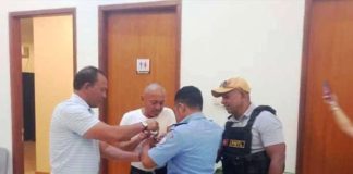 This photo from the Department of Justice shows former congressman Arnolfo Teves Jr. (second from left) after his arrest in Dili, Timor Leste in March 2024.