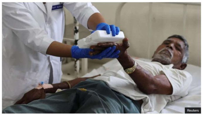 India_resized A nurse gives treatment to a 76-year-old patient of heat exhaustion inside a Heat Illness ward of a government hospital during a heatwave in Ahmedabad, India. REUTERS