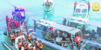 video grab released by the Public Affairs Office of the Armed Forces of the Philippines on June 19 shows China Coast Guard boats (left) ganging up on Philippine boats (center) during the June 17 incident at Ayungin Shoal in West Philippine Sea.