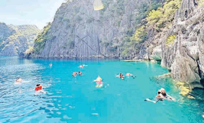 asia_outperformer Tourism receipts contribute to the country’s economic output with visitor arrivals in the first five months of 2024 totaling 2.56 million. Photo shows tourists enjoying Coron, Palawan. THEPALAWANGUIDE.COM PHOTO