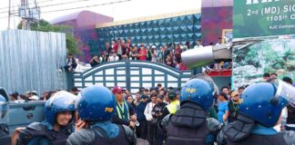 Various units from the Philippine National Police swoop down on the Kingdom of Jesus Christ compound in Davao City on June 10. They attempted to serve the arrest warrant for child abuse and human trafficking charges to the church’s leader, Apollo Quiboloy, but they did not find him. PNA