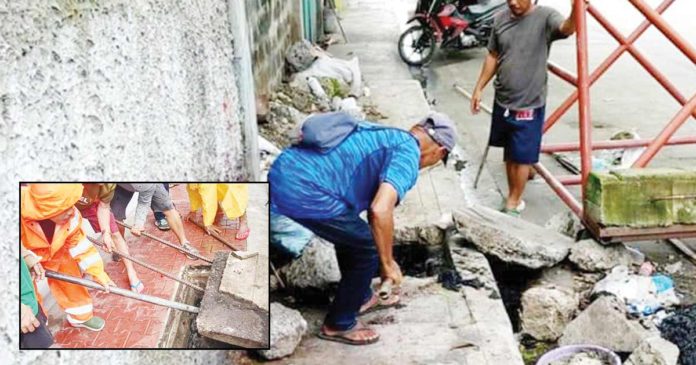 Personnel of the Iloilo City Engineer’s Office declog drainage systems in preparation for the rainy season. The city government advises the public to refrain from throwing plastics as these clog drainage systems and cause flooding. ILOILO CITY GOVERNMENT PHOTOS