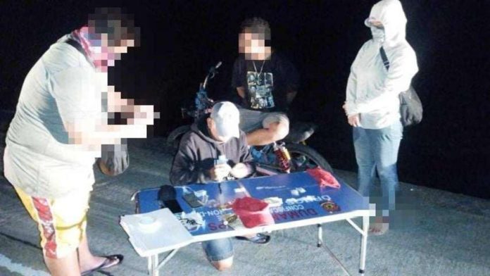 dumangas_vendor_resized A street-level drug suspect yields five plastic sachets of suspected shabu valued at P304,000 in a drug buy-bust operation in Barangay Sapao, Dumangas, Iloilo on Sunday, June 2. PRO-6 PHOTO