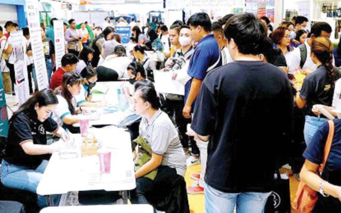 employment_rate_resized Job applicants queue up in one of the 34 participating companies and government agencies during a job fair at a mall in Marikina City on Labor Day on May 1, 2024. Philippine Statistics Authority data showed that the country's unemployment rate was at 4.0 percent in April this year, down from the recorded 4.5 percent in April 2023. PNA PHOTO BY BEN BRIONES