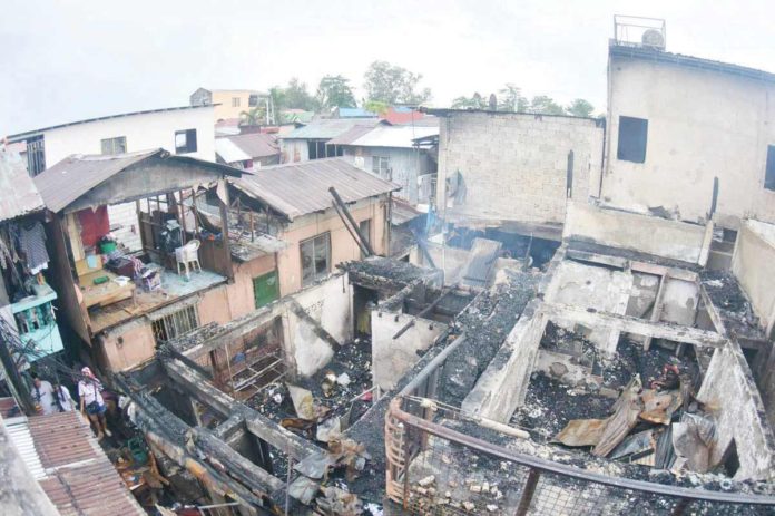 fire_pic_resized Thirty-two houses were completely destroyed and 12 suffered partial damage when a fire broke out in Barangay Tanza Bonifacio and spread to nearby Barangay Rizal Estanzuela in Iloilo City early Monday morning, June 17. ARNOLD ALMACEN/ILOILO CITY MAYOR’S OFFICE PHOTO