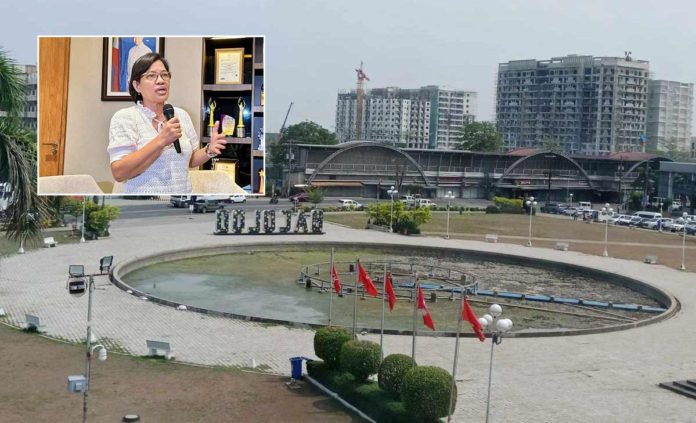 fountain City Administrator Lucille Gelvolea (inset) appeals to the public, especially those visiting Bacolod City Government Center, to avoid throwing trash in the fountain area.