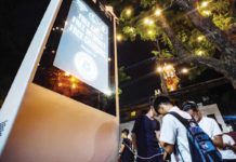 People use the newly launched ISKOnek WiFi kiosk at the park behind the Bonifacio Monument in Manila. GEORGE CALVELO, ABS-CBN NEWS/FILE PHOTO