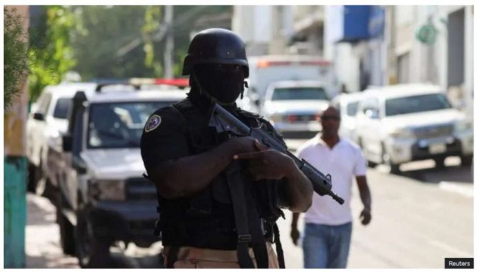 haiti.JPG_resized A police officer stands guard in Haiti’s capital Port-Au-Prince. REUTERS
